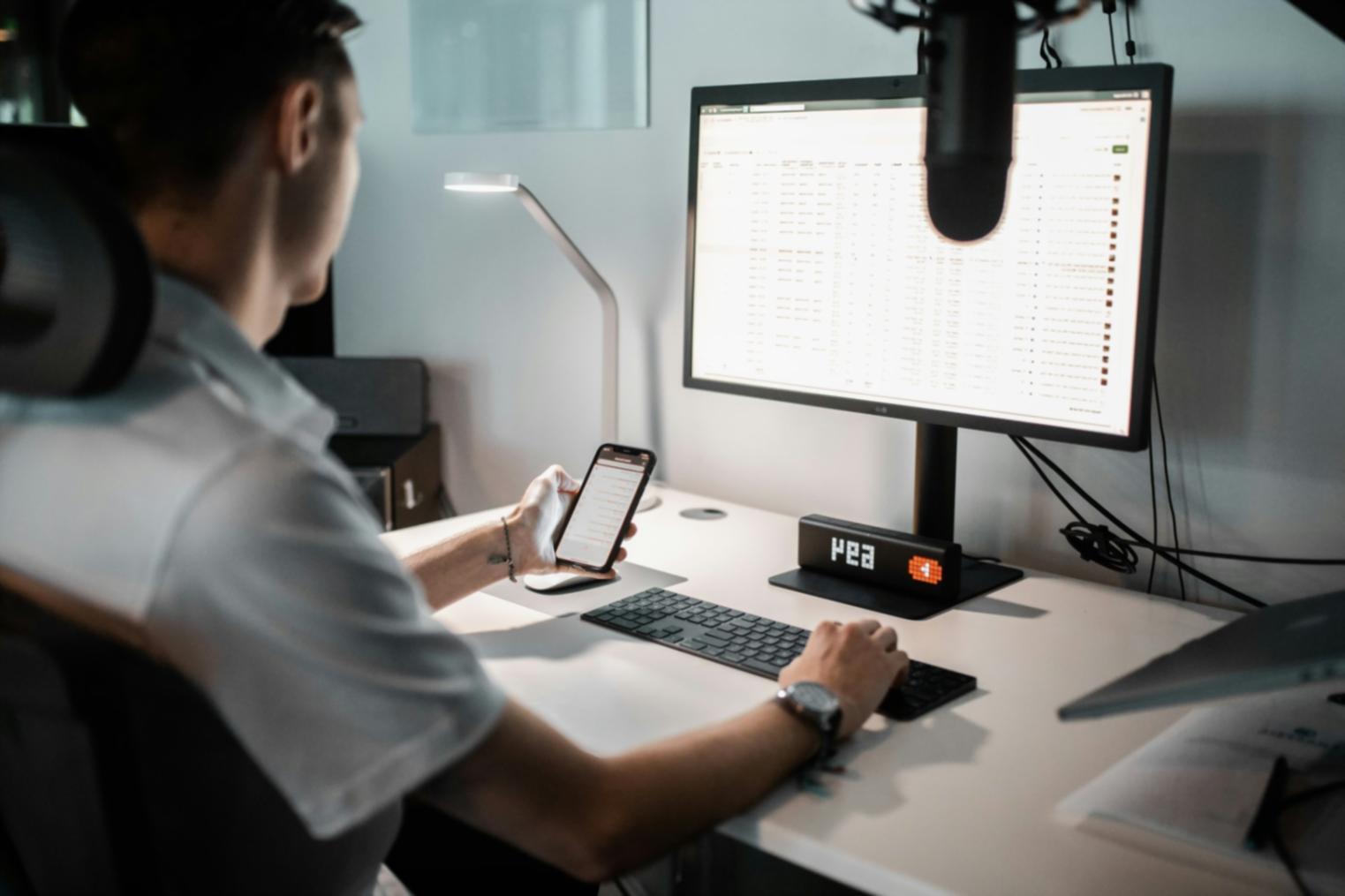 Modern financial technology workspace with clean dashboard interfaces
